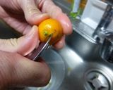 A picture of step 1 of Seasonal Kumquat Jam.