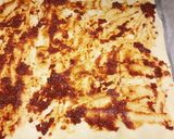 A picture of step 2 of Sun-dried tomato and prosciutto tear and share.