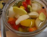 A picture of step 3 of Easy Microwaved Pickles.