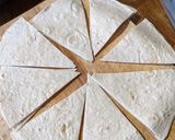 A picture of step 3 of Homemade crispy tortilla wrap dippers.