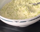Une image de l'étape 2 de Gratin de courgettes au riz et gruyère.