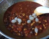 A picture of step 3 of Baked Bean With Sausage And Pearl Garlic.