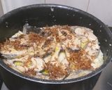 A picture of step 3 of Hilsha/Elish Polau.