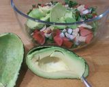 A picture of step 3 of Avocado salad in an avocado!.