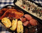 A picture of step 8 of Filling Katsu Bento.