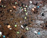 A picture of step 12 of Rootbeer Brownie Cake W/chocolate rootbeer frosting.