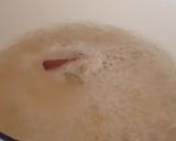 A picture of step 2 of Masala Chai (Masala Tea).