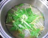 A picture of step 3 of Mizuna Chinese Soup with Chicken Skin Broth.