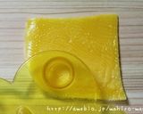 A picture of step 7 of Easy Charaben Doraemon with Nori Seaweed.