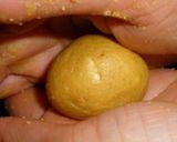 A picture of step 5 of Besan Laddu (gram flour or chickpeak flour sugar balls).