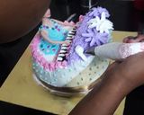 A picture of step 6 of Piano cake.
