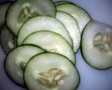 A picture of step 1 of Cucumber and Tomatoes in Plain Vinaigrette.