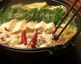 A picture of step 9 of Miso Motsu Nabe (Hakata Specialty).