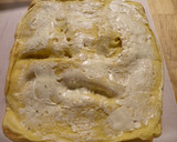 A picture of step 14 of Italian Roll Cake.
