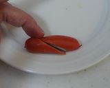 A picture of step 1 of Red Sausage Aliens for Bento.