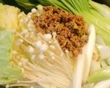 A picture of step 5 of Dan Dan Noodle Hot Pot with Lots of Cabbage and Bean Sprouts.