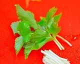 A picture of step 5 of Fragrant With Mitsuba and Yuzu! Ozouni (Mochi Rice Cake Soup for New Years).