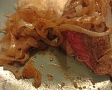 A picture of step 3 of Steak with onions.