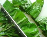 A picture of step 4 of Stir Fried Chicken and Basil over Rice.