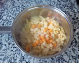 Foto del paso 6 de la receta Plumas a la boloñesa con 5 quesos al horno