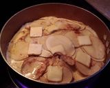 A picture of step 6 of Stove top Scalloped Potatoes.