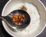 A picture of step 2 of Carrot toast with cheese spread.