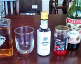 A picture of step 1 of Sweet Manhattan drink.
