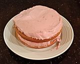 A picture of step 10 of Cherry Vanilla Layer Cake.