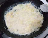 Foto del paso 3 de la receta: Zapallitos rellenos con cebolla y salsa blanca