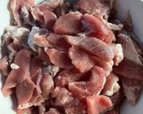 A picture of step 1 of Pork Panang Curry.