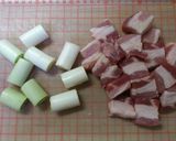 A picture of step 1 of Excellent Pork Belly Block & Japanese Leek in Delicious Sauce.