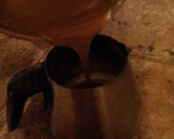 A picture of step 1 of A 'latte' the old fashioned way with smooth caramel sauce and hand made white chocolate chunks.