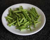 A picture of step 1 of Spicy Garlic Shoots and Atsuage.