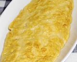 A picture of step 12 of The Golden Ratio for Dashimaki Rolled Omelet.