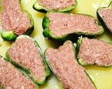 A picture of step 5 of Green Peppers Stuffed with Meat and Topped with Melted Cheese.