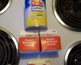 A picture of step 5 of Orange-Pineapple Paradise Cake.