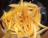 A picture of step 2 of Green Mango Som Tum Style Salad.