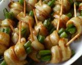 A picture of step 7 of Chikuwa Wraps with Green Beans.