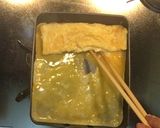 A picture of step 8 of Dashimaki Tamago (Japanese rolled omelete).