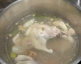 A picture of step 4 of Cook every part - Chicken broth (with some meat) from chicken back/carcass, and wing tips.