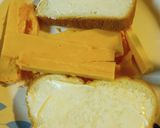 A picture of step 2 of Grilled Ham and Cheese on White Bread.