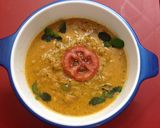 A picture of step 5 of Aaloo tomato gravy in rich coconut milk.