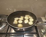 A picture of step 1 of Golden Roast Potatoes.