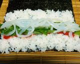 A picture of step 3 of Rolled Sushi with Squid, Ume Plum and Shiso Leaves.