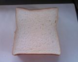 A picture of step 4 of Tastes Just Like The Cafe Ham and Cucumber Sandwich.