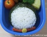 A picture of step 8 of Easy Charaben Doraemon with Nori Seaweed.