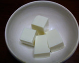 A picture of step 1 of Easy to Make in Your Microwave! Simmered Tofu with Tempura Crumbs.