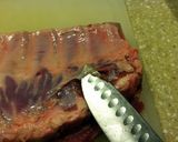 A picture of step 6 of Spiced Smoked Ribs with Orange Soda Sauce.