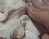 A picture of step 11 of Noodles Stuffed Bunny Chow.