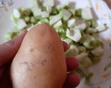 A picture of step 1 of Jhinge Aloo Posto (Turai / Ridge Gourd with Poppy seed).